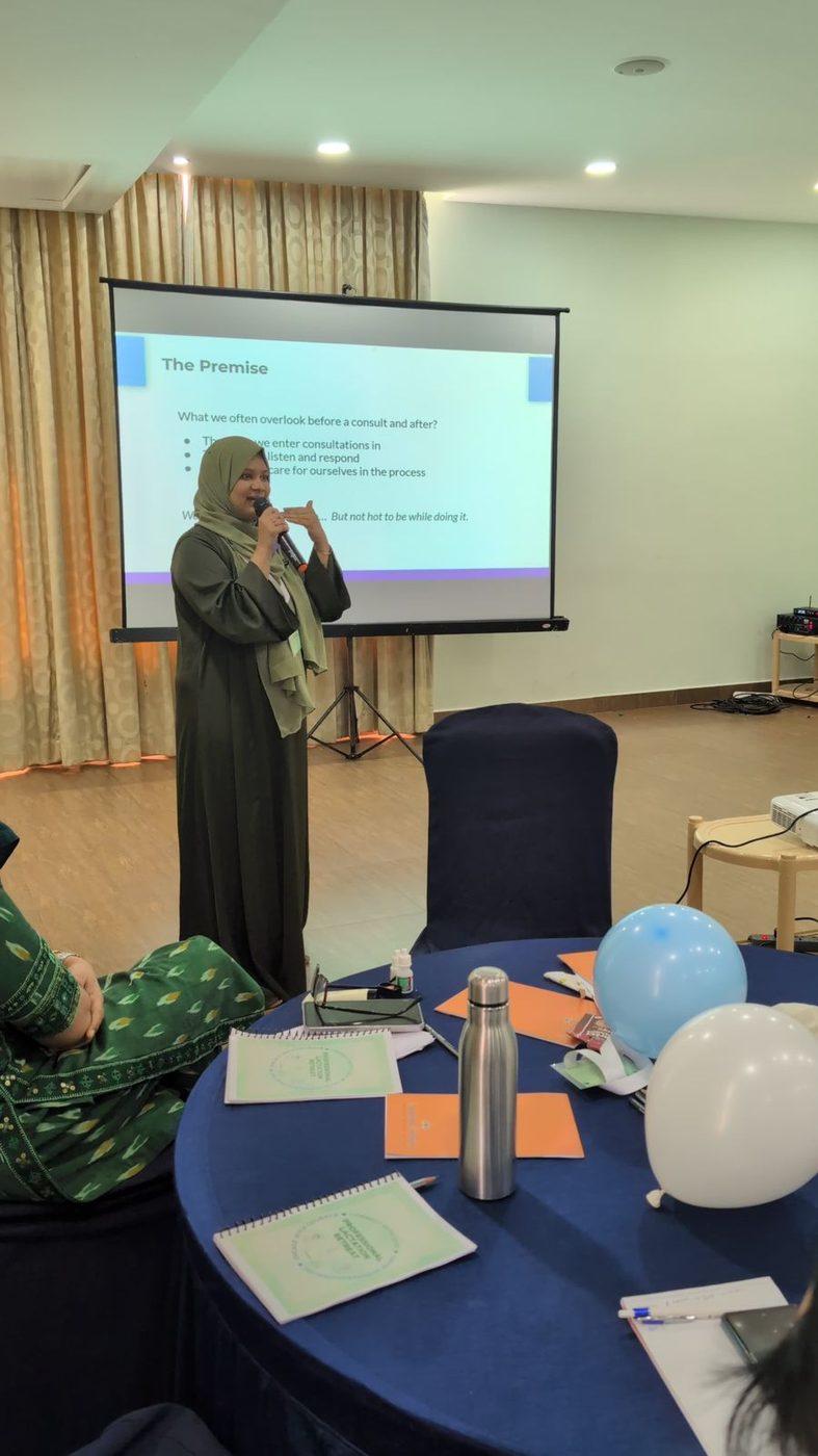 Ayisha Chandni speaking at a professional retreat
